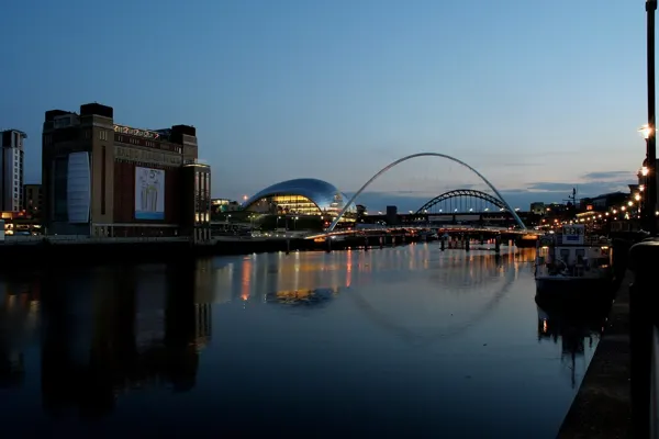 The Tyne at dusk, with BALTIC and the Gateshead Millennium Bridge.